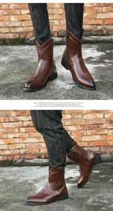 Vue détaillée des bottes de cowboy en cuir marron avec bout pointu et fermeture éclair