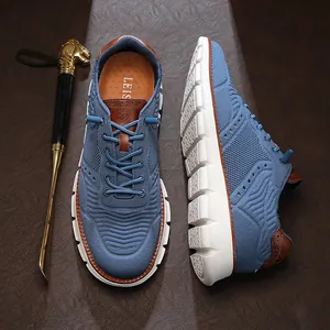 Chaussures de sport décontractées bleues en maille pour hommes avec semelle blanche