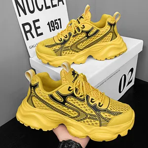 Πλάγια όψη κίτρινων chunky sneakers από mesh με αναπνεύσιμο σχέδιο και χοντρή σόλα