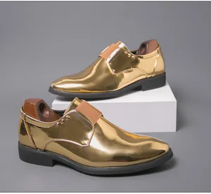 Close-up of metallic gold shiny monk strap loafers for men's stage performance or parties