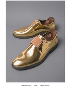 Luxurious gold metallic monk strap loafers featuring a stylish brown elastic band