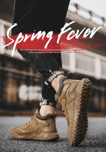 Detailed view of handmade high-top leather boots with rugged non-slip soles