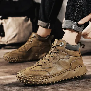Durable men's high-top handmade brown leather boots for outdoor hiking and casual wear