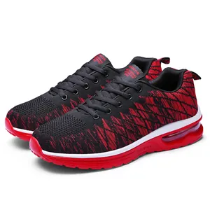 Baskets de course pour hommes en tricot rouge et noir avec semelle à coussin d'air