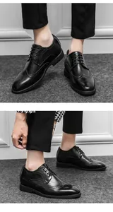 Detailansicht der schwarzen Budapester Herrenschuhe mit feinen Brogue-Verzierungen.