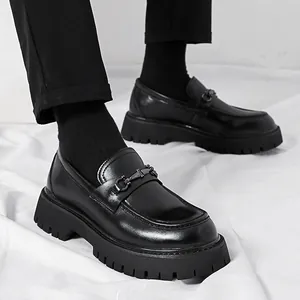 Stylish men's black leather platform loafers featuring metal horsebit and chunky lug sole