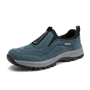 Side view of blue suede outdoor men's shoes with slip-resistant thick rubber soles