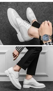 Detailansicht weißer Brogue-Schuhe mit klassischem Lochmuster für Herren in Business-Optik