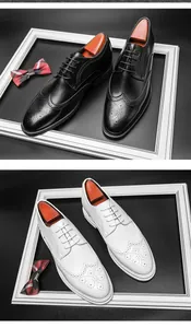 Klassische Brogue-Herrenschuhe in Schwarz und Weiß mit edler Lochverzierung