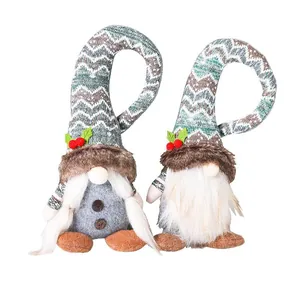 Set of two festive Christmas gnome curtain buckles with knitted hats and faux fur beards