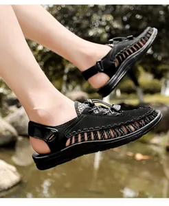 Side view of men's black woven sandals featuring a flexible drawstring and open-heel design.