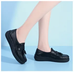 Black slip-on nurse shoes with wedge soft sole for comfort and non-slip grip