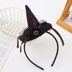 Detailed view of Halloween witch hat headband with purple spiderweb pattern and black lace