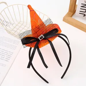 Vibrant Halloween orange witch hat headband featuring a glittery spiderweb pattern