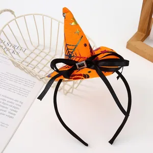Halloween witch hat headband with orange spider web pattern and black ribbon bow