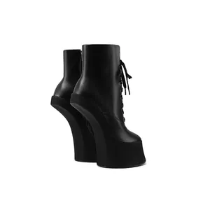Rear view of black heelless platform boots showing unique gravity-defying design