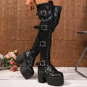 Gothic black over-the-knee boots with silver buckles and tall platform chunky heels.