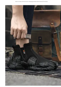 Side view of black high-top men's work boots with rugged anti-slip soles for outdoor use