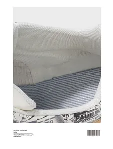 Gros plan sur la doublure en maille respirante et la tige à motifs d'une basket pour homme.