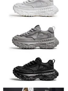 Vista dettagliata di sneakers traspiranti con suola spessa in bianco, grigio e nero