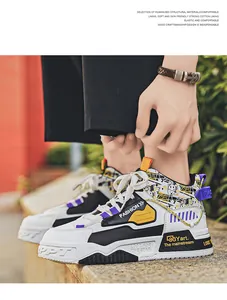 Vue détaillée de baskets montantes à graffiti pour hommes avec accents tendance.