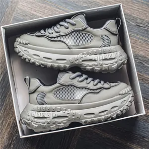 Sneaker platform chunky in mesh traspirante verde-grigio con suole spesse a carrarmato