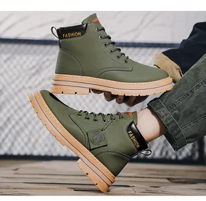 Detailed view of olive green men's hiking boots with thick soles and lace-up design