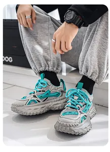 Ademende grijze en teal chunky herensneakers met trendy dikke banden-stijl zolen