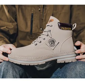 Detailed view of beige men's Martin boot with durable rubber sole and lace-up closure.