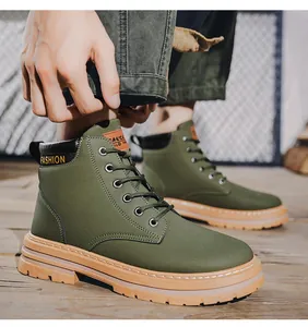 Close-up detail of olive green men's hiking boots featuring durable non-slip soles