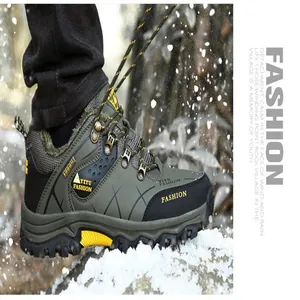 Detailed view of durable men's winter hiking boots featuring warm velvet lining in the snow