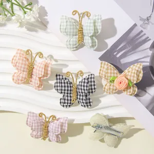 Geruite stoffen vlinder haarspeldjes voor meisjes in diverse zachte pastelkleuren