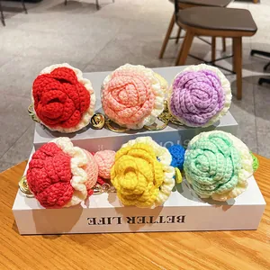 Handmade crochet rose flower keychains in assorted vibrant colors for girls' bags