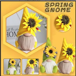 Detail view of cute spring sunflower gnomes with fluffy beards and colorful felt hats