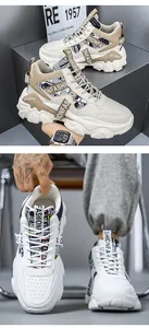 Detailed view of high-top chunky sneakers with street-style fashion text patterns