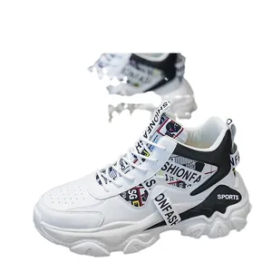 Stylish white chunky sneakers with thick platform soles and black contrast accents