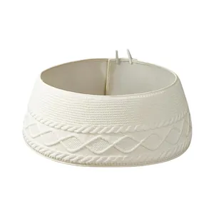 Elegant white cable-knit Christmas tree collar base cover for festive holiday decor