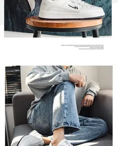 Lifestyle view of men's white fashionable sneakers worn with denim jeans on a couch.