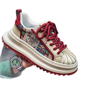 Men's shell-toe platform sneakers featuring ethnic woven panels and red laces