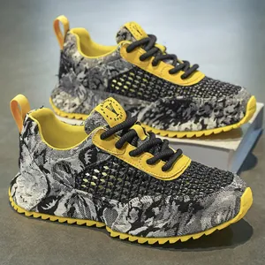Scarpe da ginnastica traspiranti da uomo in mesh giallo e nero con motivo grafico