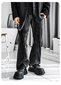Close-up view of black men's platform derby shoes featuring textured toe and thick sole.