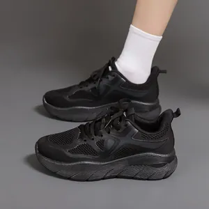 Side view of lightweight black running shoes with shock-absorbing thick soles