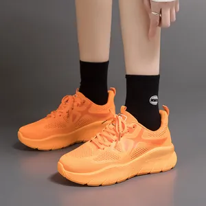 Vibrant orange men's ultra-light mesh running shoes for gym and indoor fitness activities