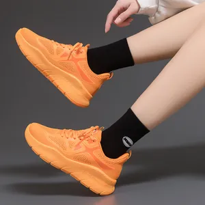 Vibrant orange ultra-light running shoes for men with shock-absorbing thick soles