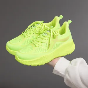 Neon lime green ultralight men's running shoes with shock-absorbing thick soft soles