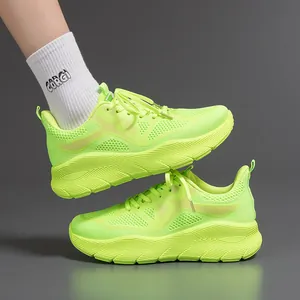 Side view of ultra-light neon green running shoes with thick shock-absorbing soles