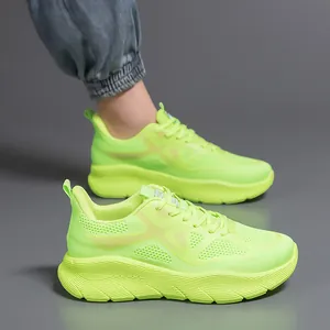 Detail shot of neon green breathable mesh running shoes with thick cushioned soles