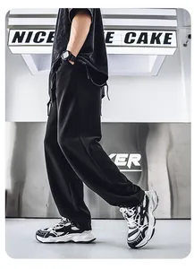 Detailed side view of stylish black and white chunky dad sneakers for men