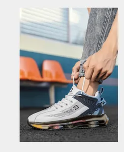 Action shot of tying white and blue high-top air cushion basketball sneakers