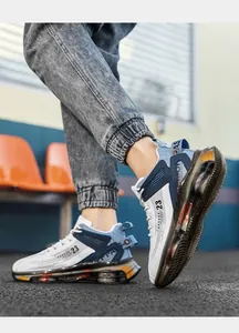 Detail shot of men's high-top basketball shoes with large visible air cushion sole